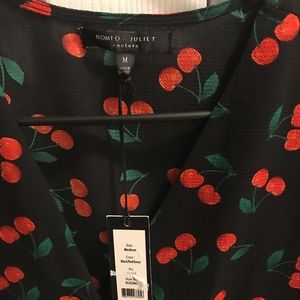 Romeo & Juliet Couture Tops - Romeo and Juliet brand new cherry top. Romeo & Juliet Couture Tops - Romeo and Juliet brand new cherry top.